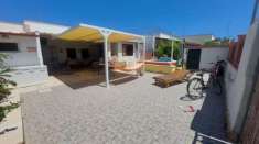 Foto A DUE PASSI DAL MARE  CON CORTILE