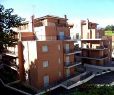 Foto APPARTAMENTO CON GIARDINO E POSTO AUTO