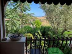Foto Appartamento con spazi esterni, posto auto e vista mare