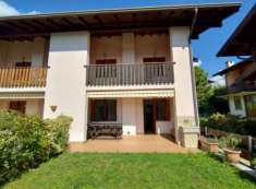 Foto Bilocale con taverna e giardino privato.