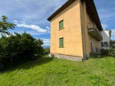 Foto Casa con giardino panoramico