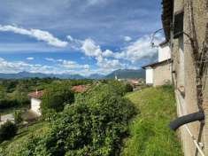 Foto Casa con giardino panoramico
