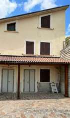 Foto CASALE LEGNO E PIETRA RISTRUTTURATO