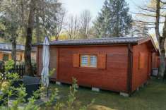 Foto Chalet in legno in villaggio turistico