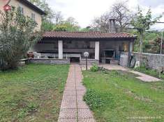 Foto Cuvio - bilocale con giardino e box