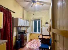 Foto FABBRICATO CON DUE UNITA', MANSARDA E DUE GARAGE IN CENTRO