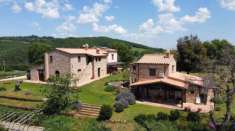 Foto MANCIANO (GR), Podere Poggio Monte, magnifica Tenuta di 58 ettari con Agriturismo e piscina sulle colline della Maremma Toscana.
