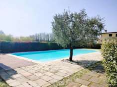 Foto MODERNO TRILOCALE CON PISCINA