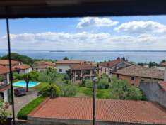 Foto Nel Centro di Moniga: Prestigiosa Porzione di Villa con Vista Mozzafiato