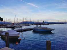 Foto Nuovo appartamento attico con scorcio di vista lago