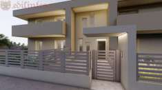 Foto NUOVO ED AMPIO QUATTRO LOCALI CON STUPENDO GIARDINO  E BOX DOPPIO IN PALAZZINA DI MODERNO ED ELEGANTE DESIGN