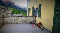 Foto Porzione di bifamiliare con garage e giardino