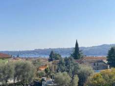 Foto Sal: Il Tuo Investimento di Prestigio con Vista Lago