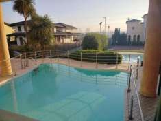 Foto SPLENDIDO TRILOCALE IN RESIDENCE CON PISCINA