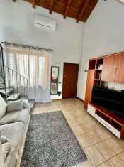 Foto Taino - ampio bilocale con giardino