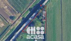 Foto TERRENO CON DEPOSITI