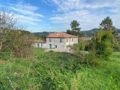 Foto TERRENO CON FABBRICATI E CAPANNONE