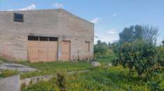 Foto Terreno i mq 15.000 con caseggiato