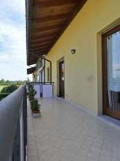 Foto Tricamere con terrazzo vivibile e giardino comune