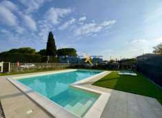 Foto TRILOCALE CON TERRAZZO IN RESIDENCE CON PISCINA A 300M DAL LAGO