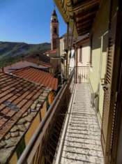 Foto VENDESI AD AURIGO CASA IN CENTRO PAESE CON DUE ALLOGGI E CANTINE