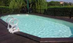 Foto Vendo terreno con piscina e roulotte