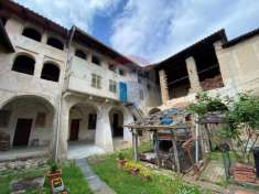 Foto Villa a schiera in vendita a Mezzana Mortigliengo - 11 locali 198mq
