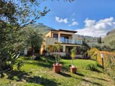 Foto Villa vista mare in residence con piscina