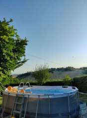 Foto Villetta in bifamiliare con giardino