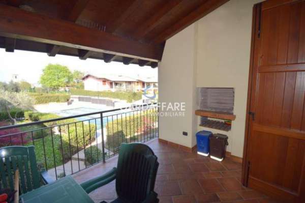 Foto GRAZIOSO APPARTAMENTO IN CURATO RESIDENCE CON PISCINA A MANERBA DEL GARDA